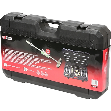 Schwarzer Werkzeugkoffer, Aufdruck mit technischen Daten und Werkzeug-Sets. Im geöffneten Zustand sichtbar.